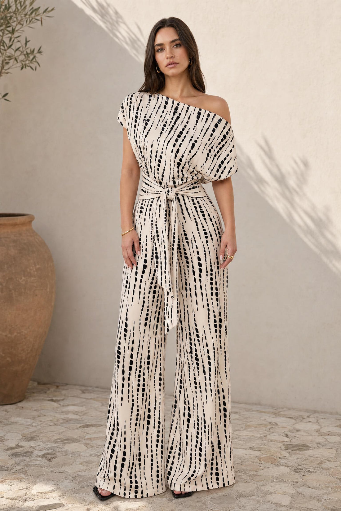 Tara - Gestreifter Jumpsuit mit Dreiviertelarm