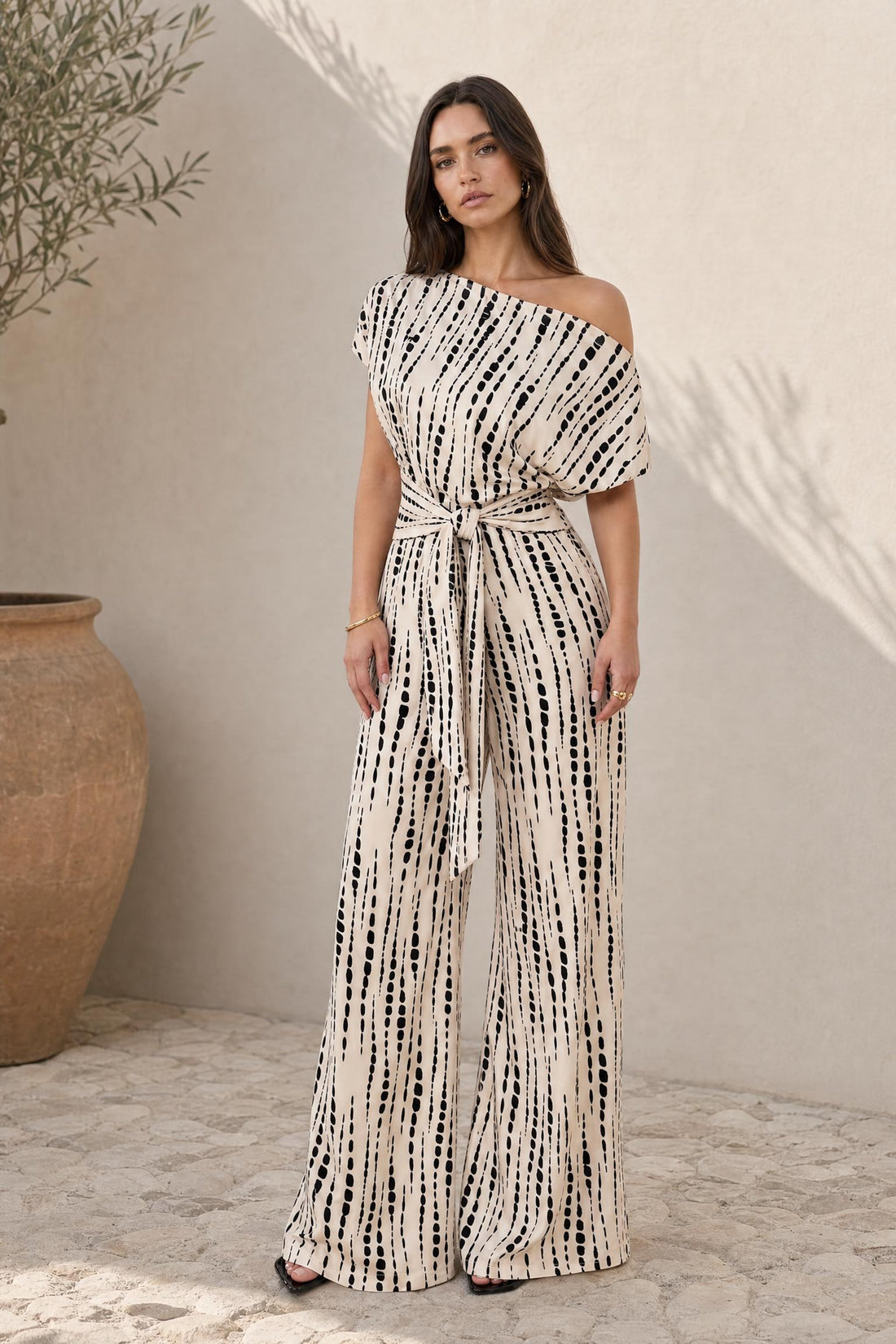 Tara - Gestreifter Jumpsuit mit Dreiviertelarm