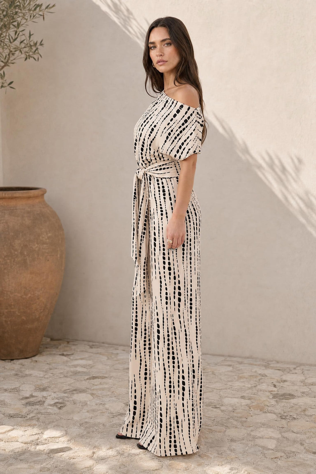 Tara - Gestreifter Jumpsuit mit Dreiviertelarm